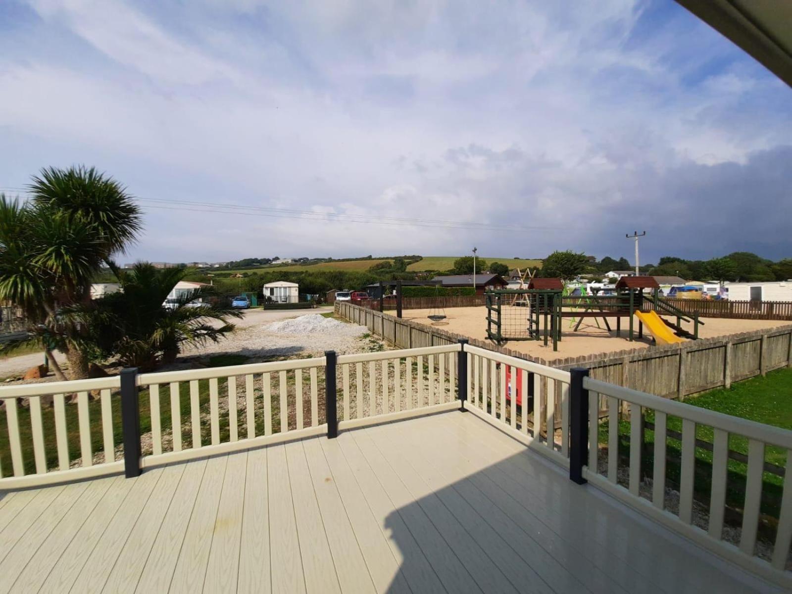 Sunset Retreat Caravan With Large Wrap Around Decking Holiday home